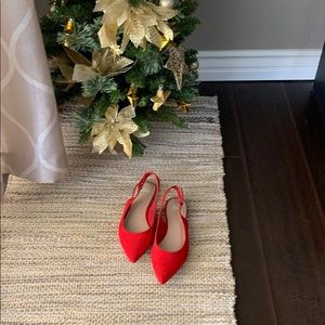 A fun, flirty red slingback pair of flats